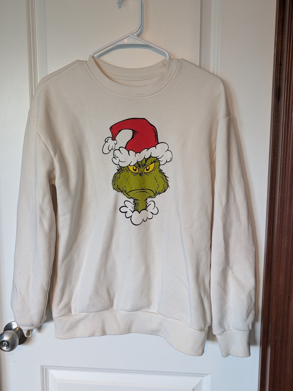 Hybrid Apparel Cream Crewneck with Grinch Graphic and Red Santa Hat